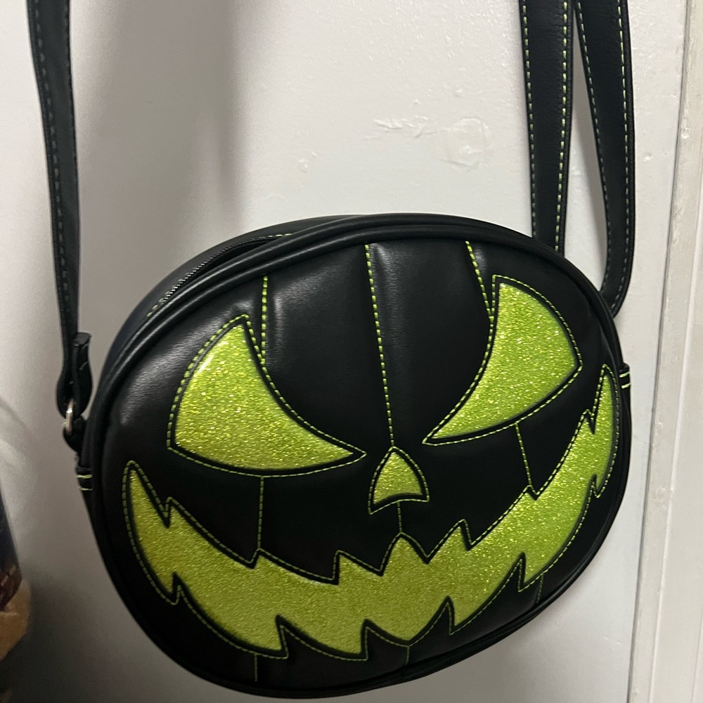 Love pain and stitches purse